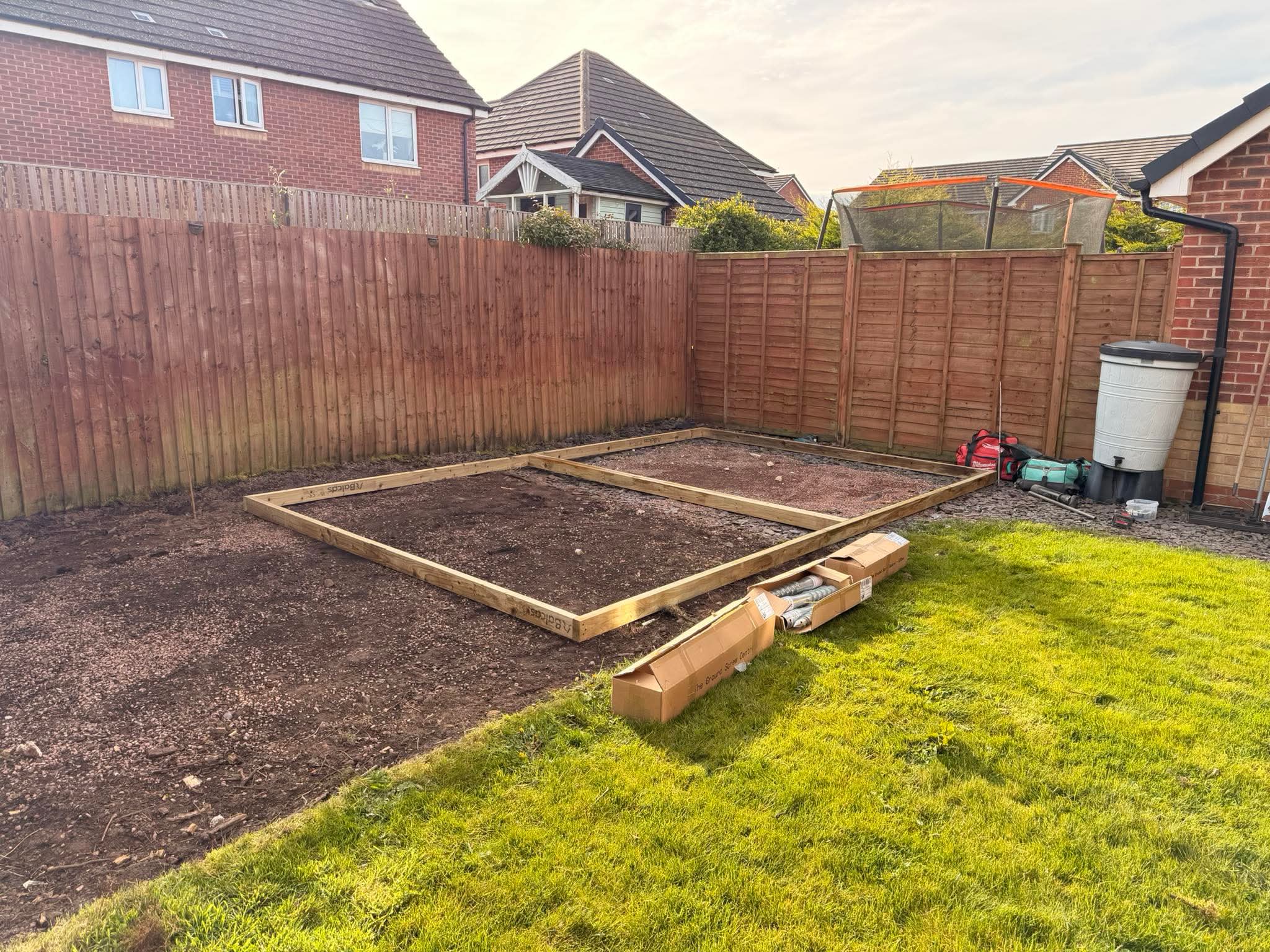 Garden before build — foundation frame laid